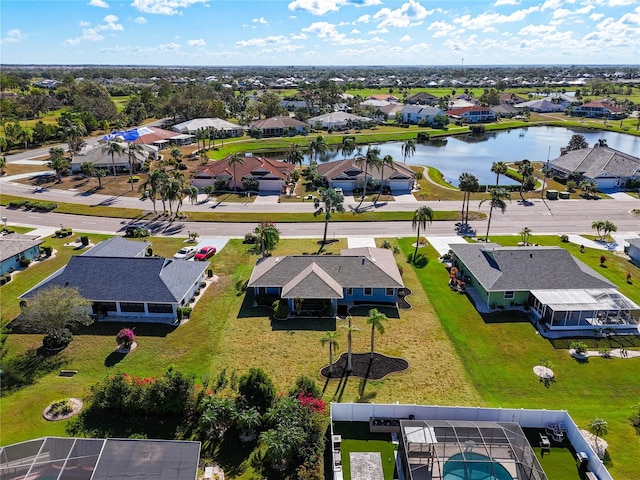 drone / aerial view with a water view