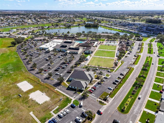 birds eye view of property featuring a water view