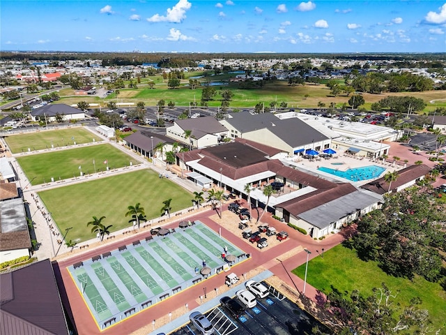 drone / aerial view of a pool area