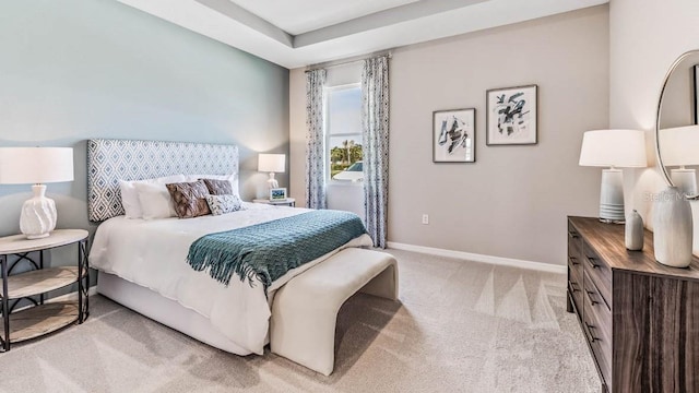 bedroom with light colored carpet