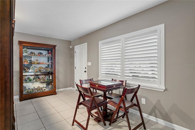 dining room with light tile patterned flooring