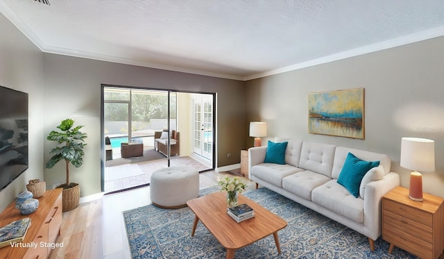 living room with hardwood / wood-style floors and crown molding