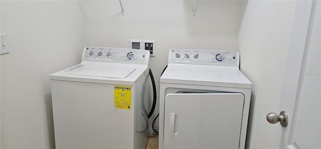 laundry area featuring washing machine and dryer