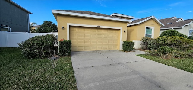 single story home featuring a front yard and a garage