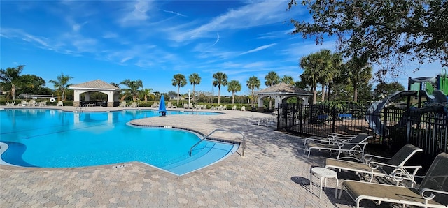 view of pool featuring a gazebo and a patio