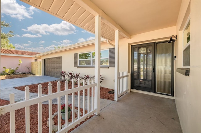 property entrance with a garage