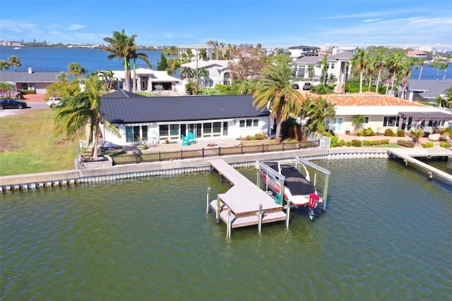 dock area featuring a water view