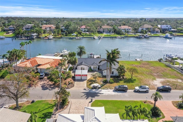 drone / aerial view with a water view