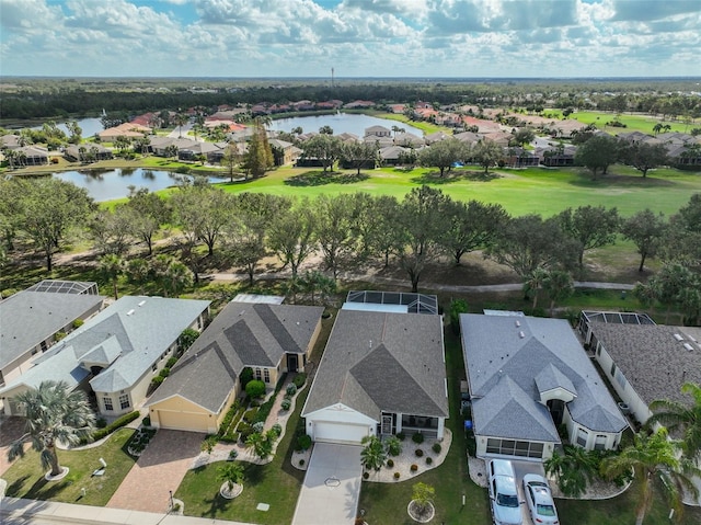 1120 Emerald Dunes Dr, Sun City Center, FL 33573 - aerial view of residential area featuring a nearby body of water
