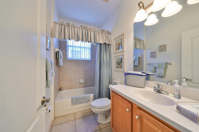 full bathroom with tile patterned floors, vanity, toilet, and shower / bath combo with shower curtain