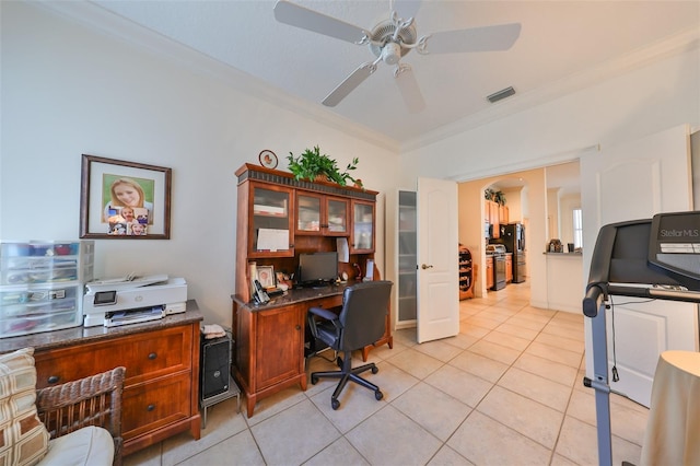 office space with crown molding, light tile patterned flooring, and ceiling fan