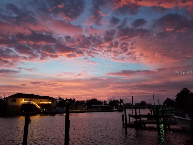 property view of water featuring a dock