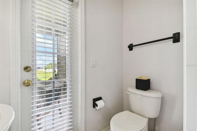 bathroom featuring toilet