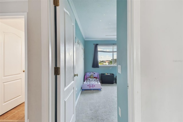 corridor with light carpet and ornamental molding