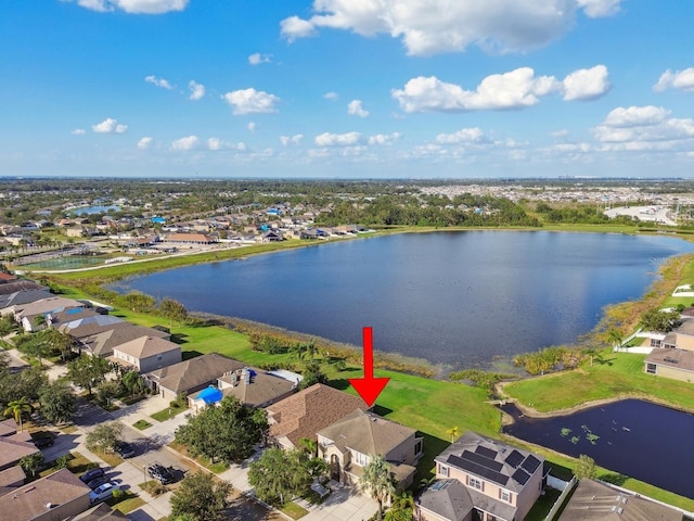 aerial view with a residential view and a water view