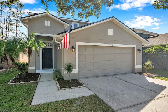 view of front of home with a garage