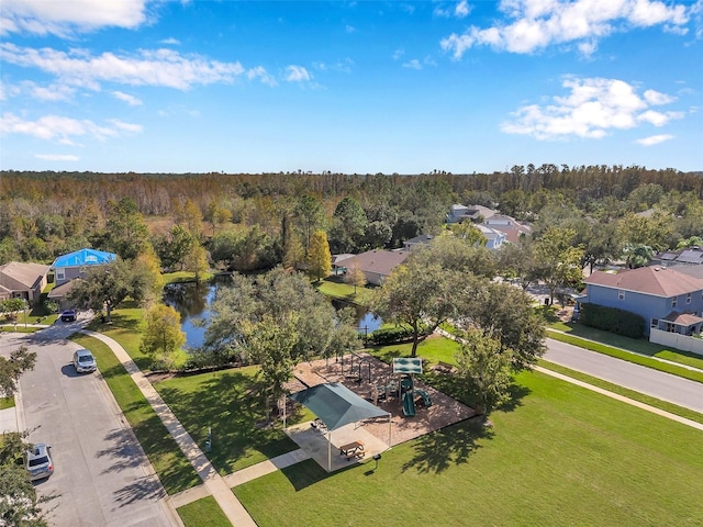 birds eye view of property featuring a water view