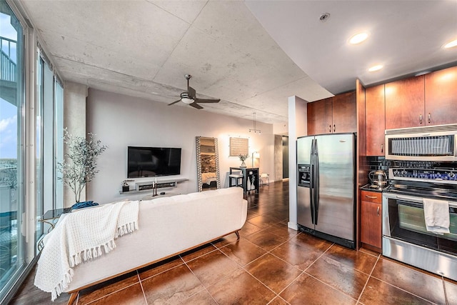 kitchen with ceiling fan and appliances with stainless steel finishes