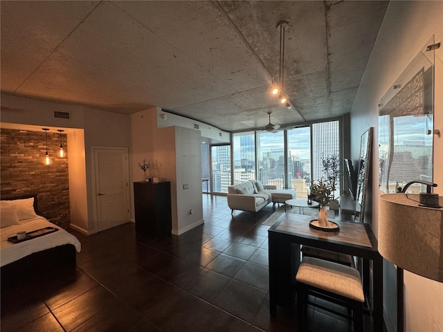 tiled living room with expansive windows