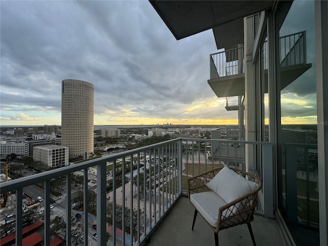 view of balcony at dusk