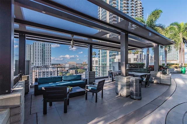 view of patio with a pergola and an outdoor living space