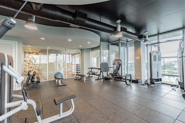 workout area with expansive windows