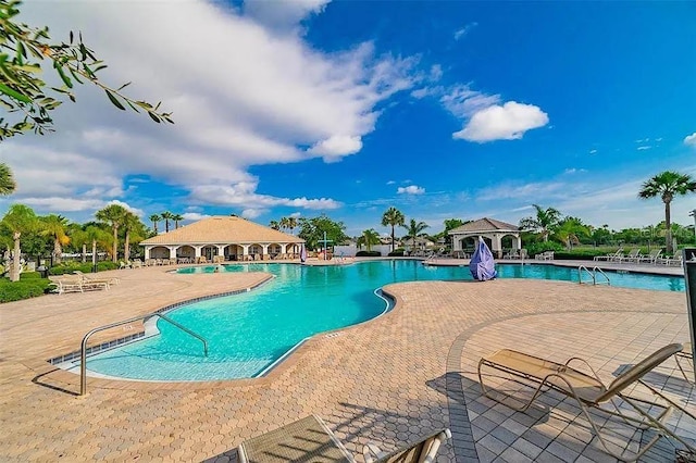 view of pool featuring a patio