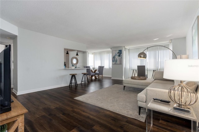 living room with dark wood-type flooring