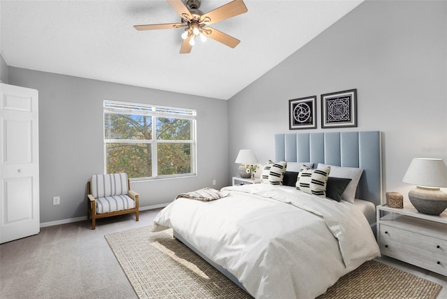 bedroom with light carpet, ceiling fan, and lofted ceiling