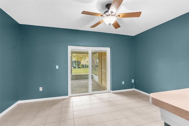 spare room featuring ceiling fan