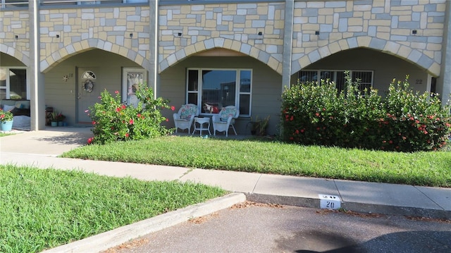 exterior space with a lawn