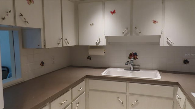 kitchen with white cabinets and sink