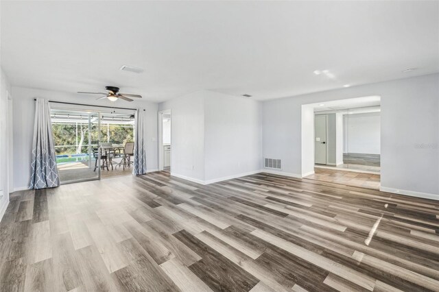 interior space featuring hardwood / wood-style flooring and ceiling fan