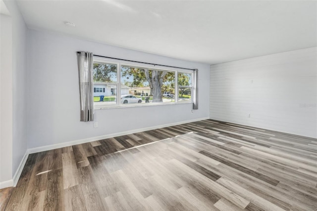 empty room with light wood-type flooring