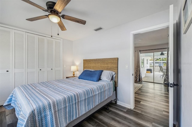 bedroom featuring ceiling fan and dark wood-type flooring