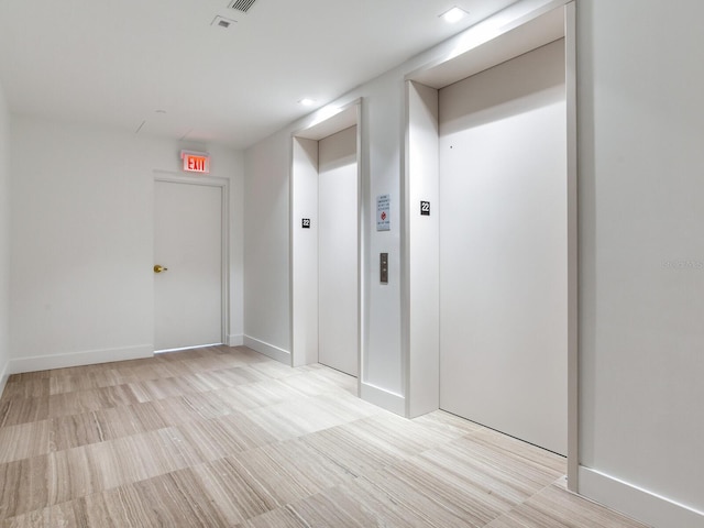 2912 W Santiago St Unit 2204, Tampa, FL 33629 - hallway featuring elevator and baseboards