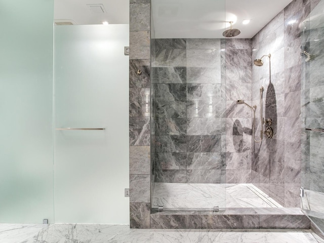 bathroom with an enclosed shower