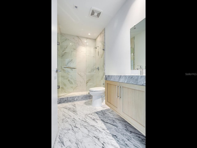 2912 W Santiago St Unit 2204, Tampa, FL 33629 - bathroom featuring toilet, a marble finish shower, vanity, and marble finish floors