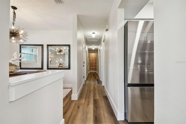 hallway featuring hardwood / wood-style flooring