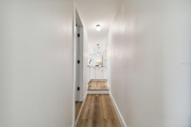 corridor featuring light hardwood / wood-style flooring