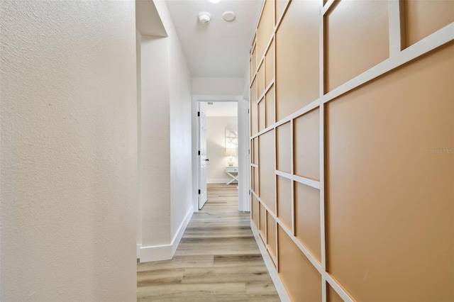 hallway featuring light hardwood / wood-style floors