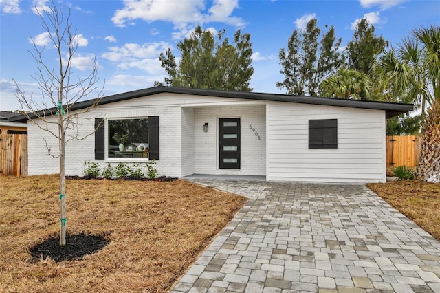 view of front of house with a patio area