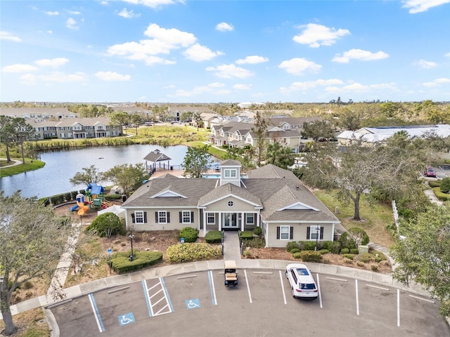 drone / aerial view with a water view