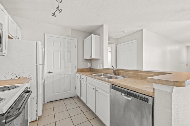 kitchen featuring sink, white cabinets, stainless steel dishwasher, and a textured ceiling