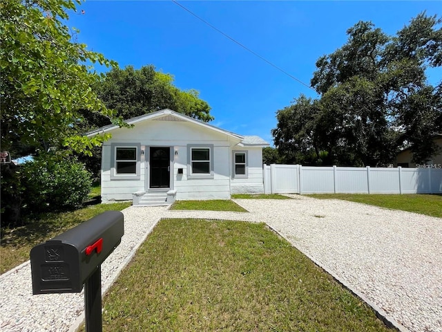 view of front of home with a front lawn