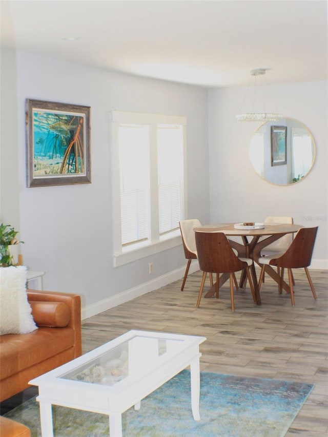 dining space featuring light hardwood / wood-style floors