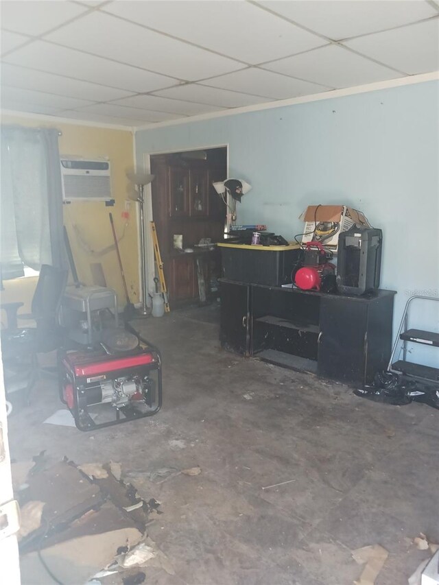 321 77th Ave, St Pete Beach, FL 33706 - misc room with a workshop area and a drop ceiling