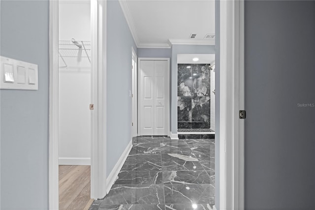 corridor with crown molding and dark hardwood / wood-style flooring