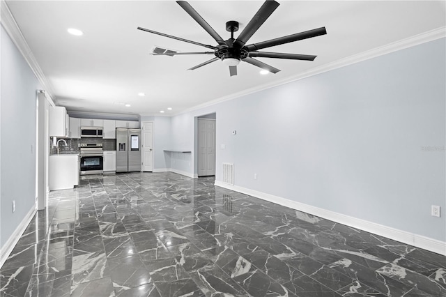 unfurnished living room featuring ceiling fan, ornamental molding, and sink