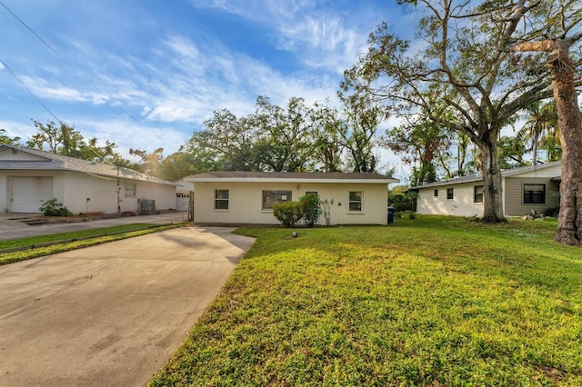 ranch-style home with a front lawn